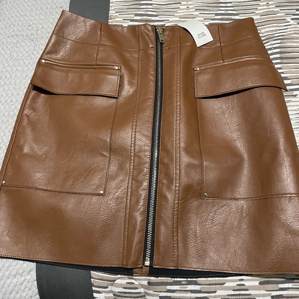 Faux leather zip front mini skirt